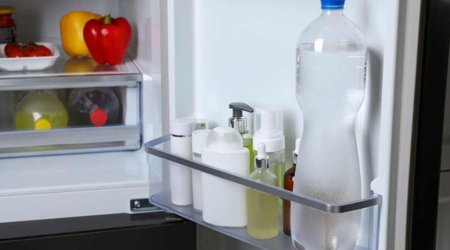 Skincare products neatly arranged inside a small refrigerator, emphasizing cold preservation for maximum potency and freshness.